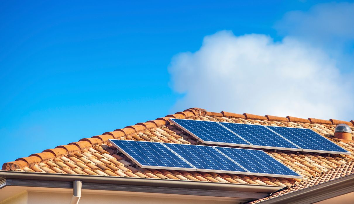 Industrial factory rooftop covered with solar panels